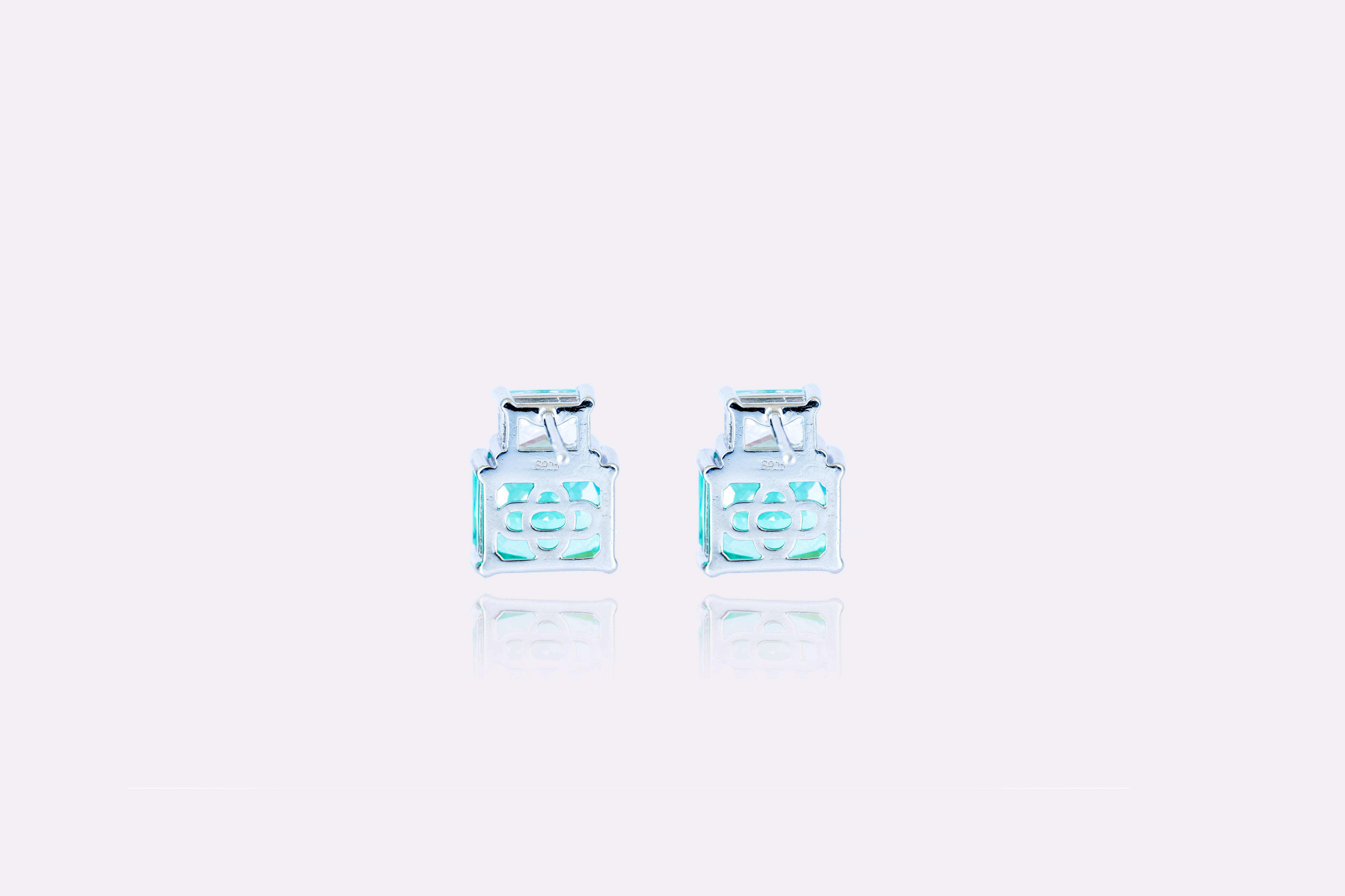 Emerald Essence: Classic Emerald and Diamond Stud Earrings 
