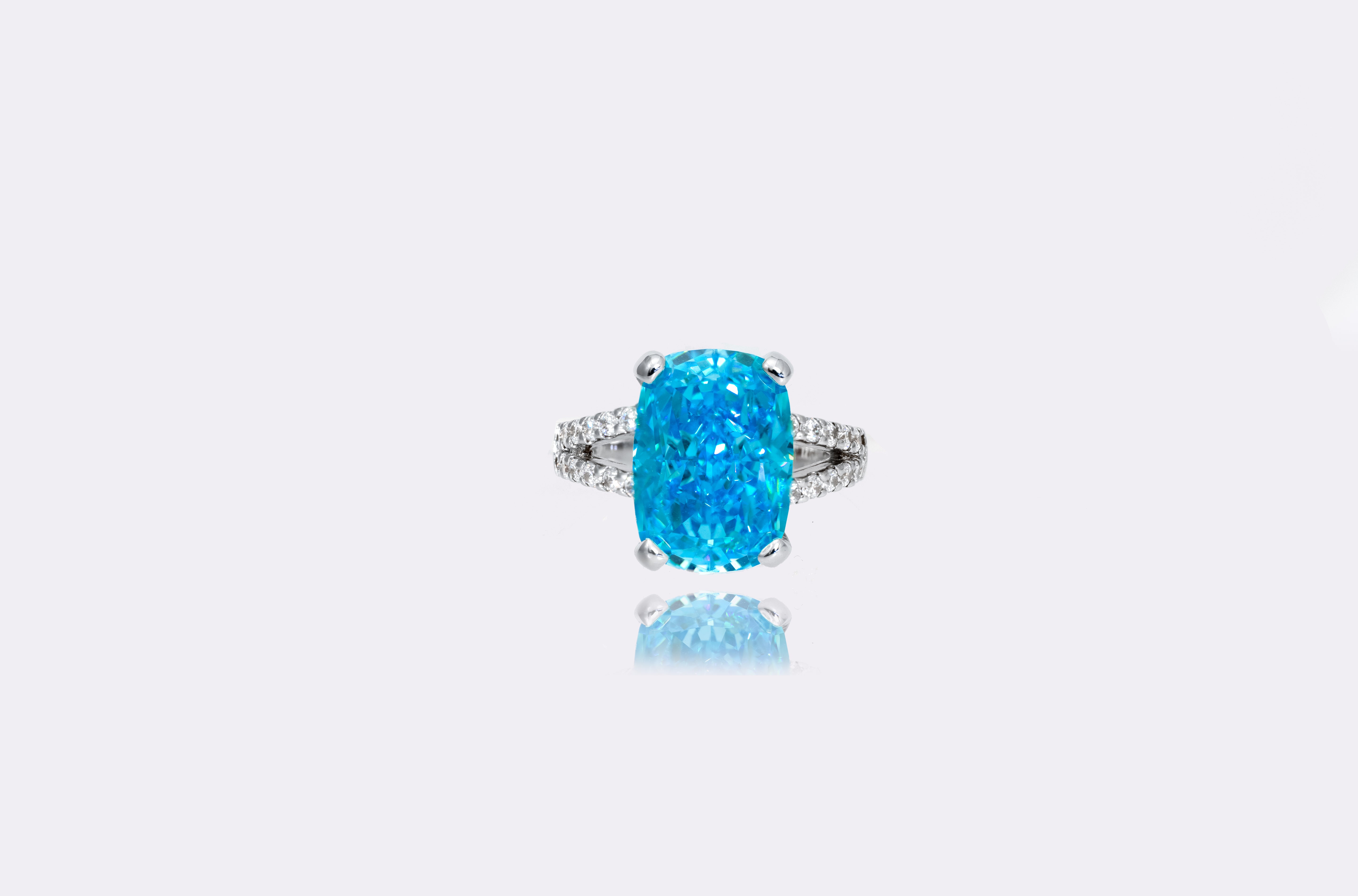 Ocean Blue Aquamarine Halo Ring in Sterling Silver