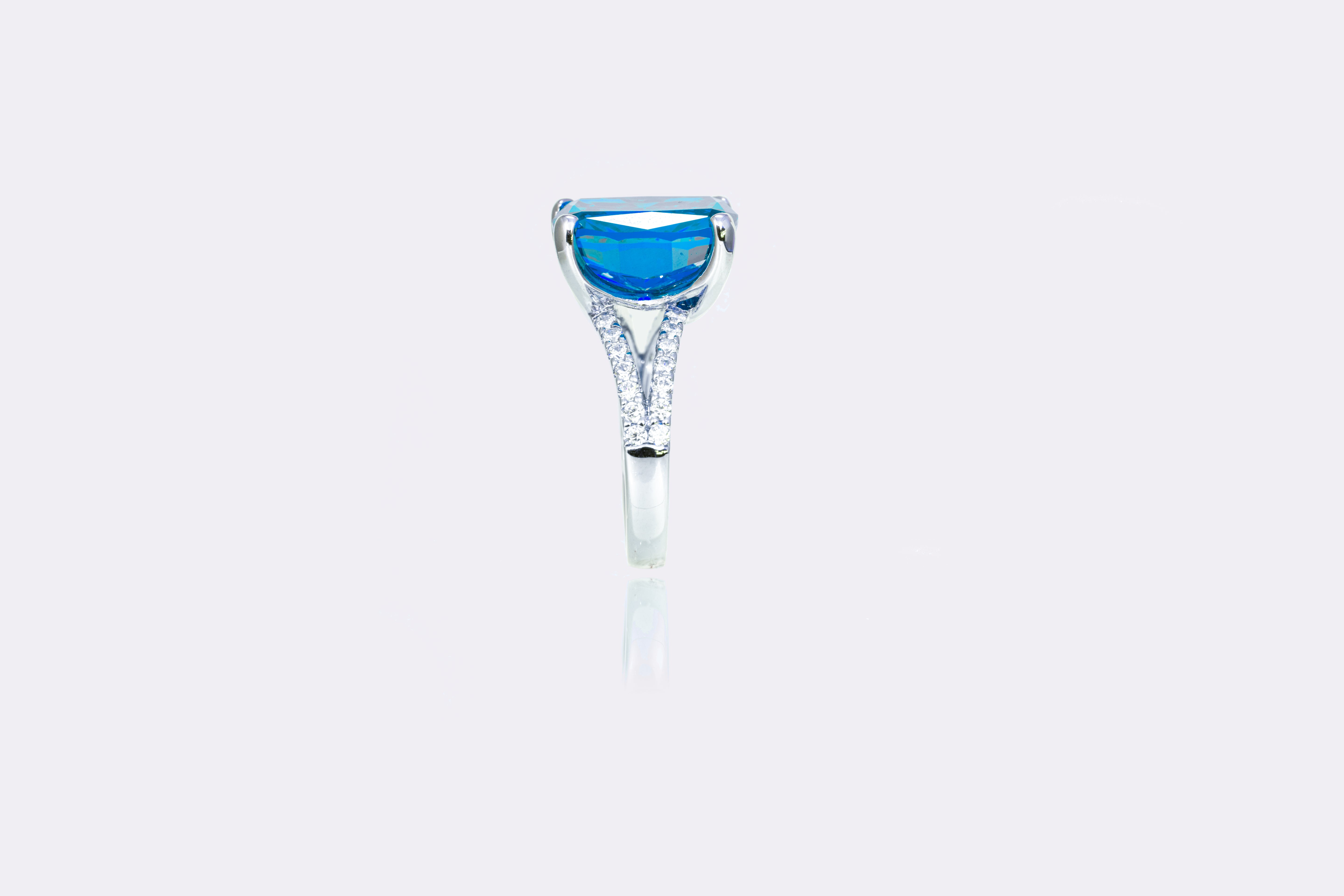 Ocean Blue Aquamarine Halo Ring in Sterling Silver 